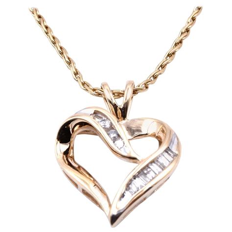 Simple heart necklace in 14 carat yellow gold (585) in anchor style